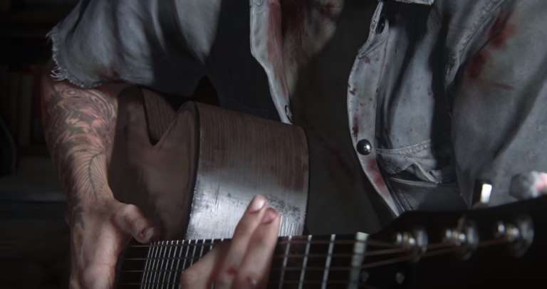 Ellie playing the guitar in The Last of Us Part 2