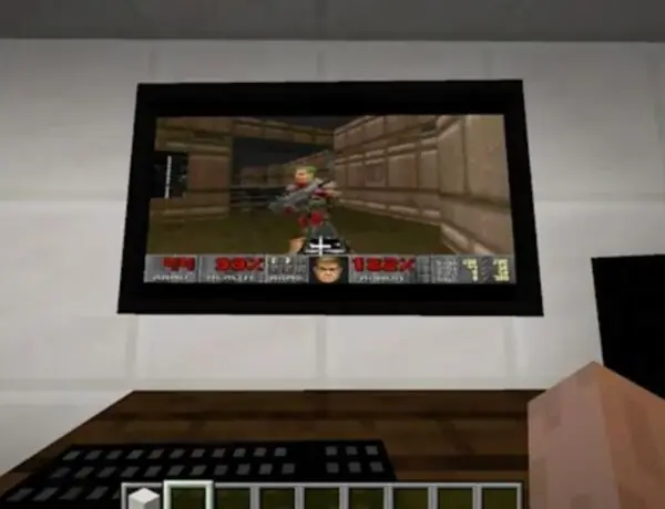 A Gamer Of The Video Game Minecraft Discovers A Technique To Make Doom Run On A Sizable Screen Inside The Game By Using Just The Vanilla Version Of The Title