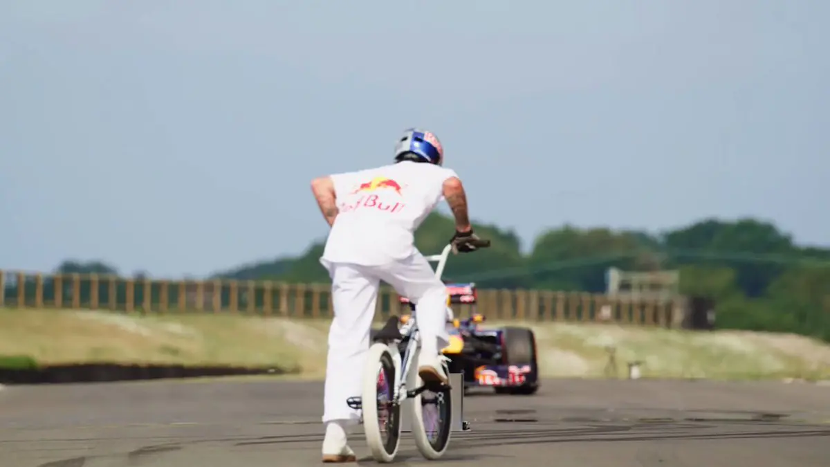 Pro BMX Rider Kriss Kyle Pulls Off Insane Jump Over Moving Red Bull F1 Car